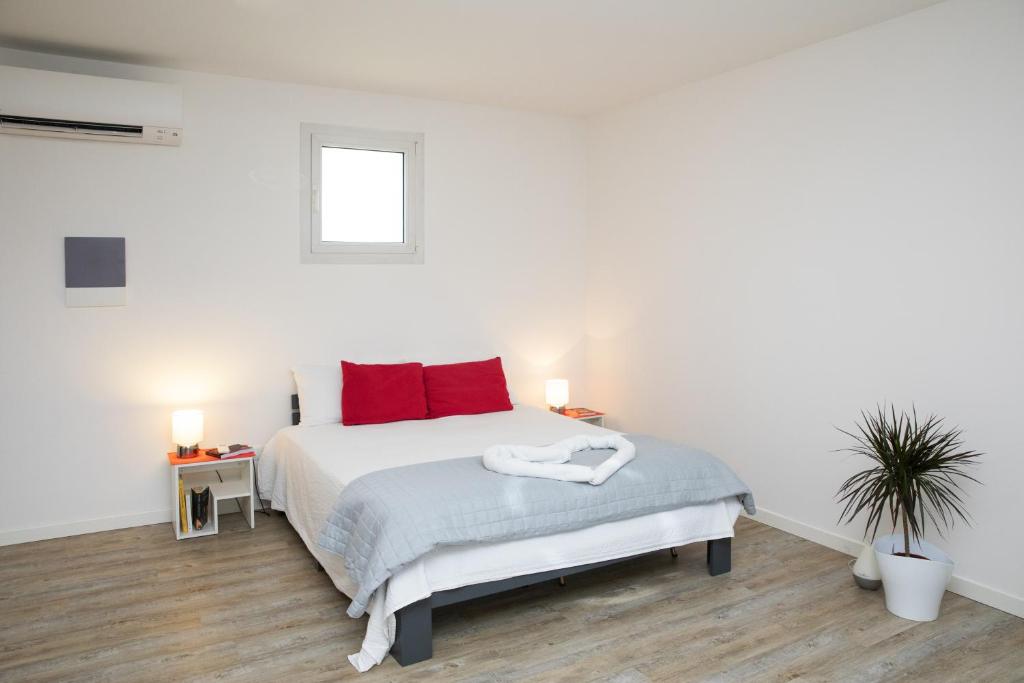 Postel nebo postele na pokoji v ubytování Ragaraja private suite & SPA