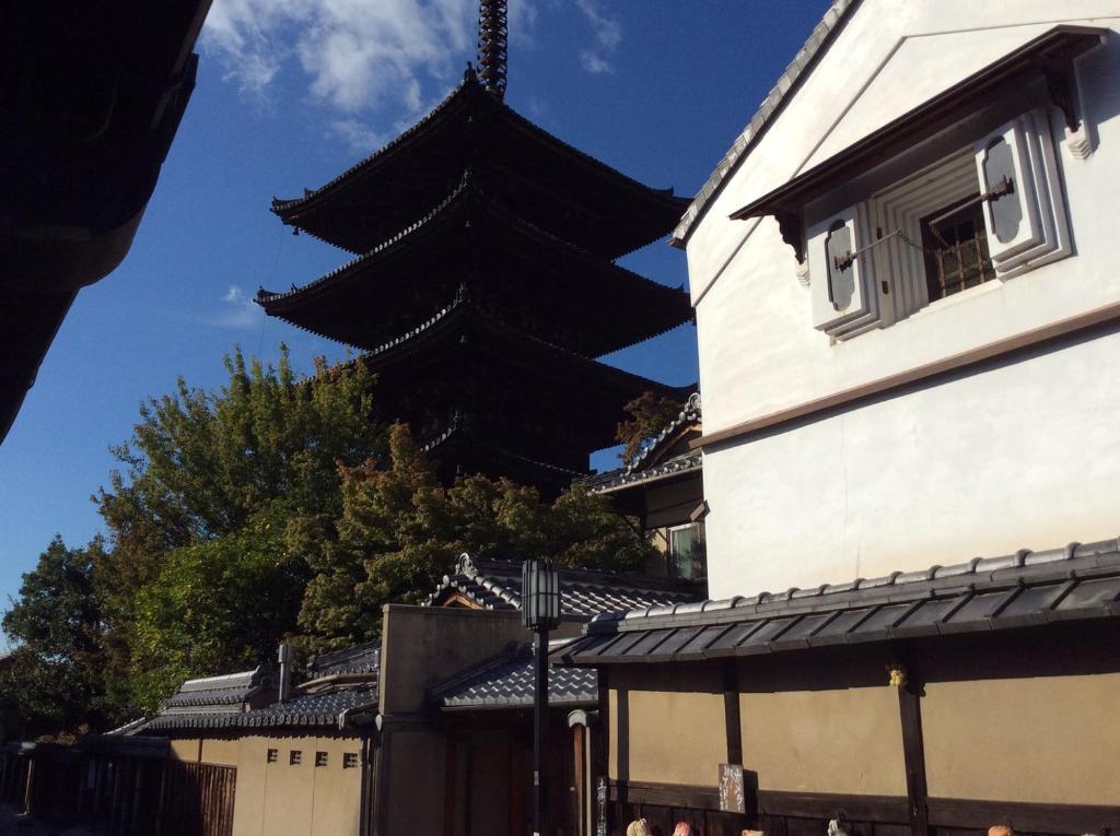 a large building with a large black pagoda at Kiyomizu Machiya Inn in Kyoto