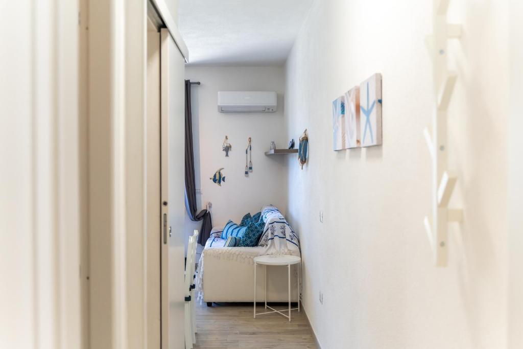 Łóżko lub łóżka w pokoju w obiekcie Stella Marina beach house