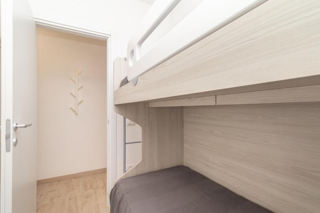 Łóżko lub łóżka w pokoju w obiekcie Stella Marina beach house