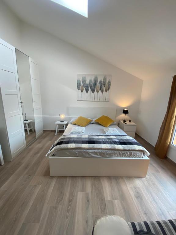 A bed or beds in a room at Il Fiore della fiera