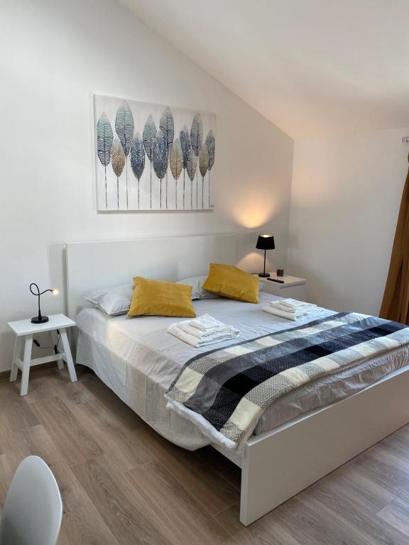 A bed or beds in a room at Il Fiore della fiera