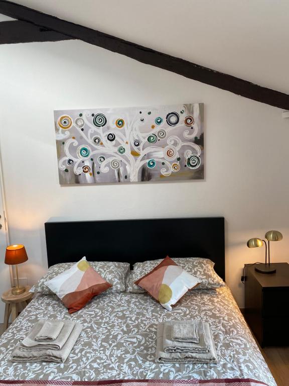 A bed or beds in a room at Il Fiore della fiera