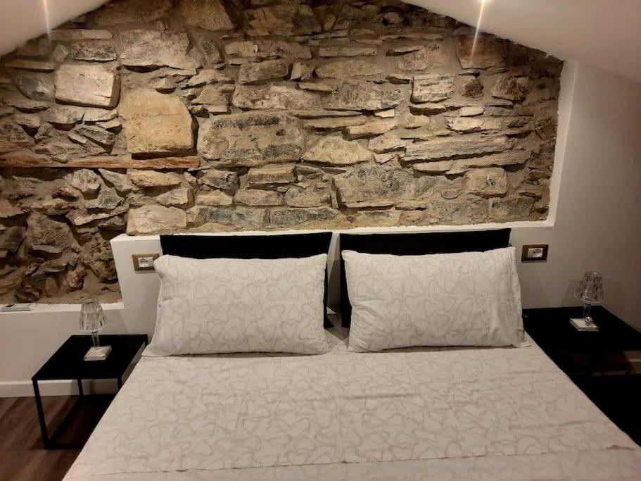 Postel nebo postele na pokoji v ubytování Luxury Room La Terrazza sul Lago di Como