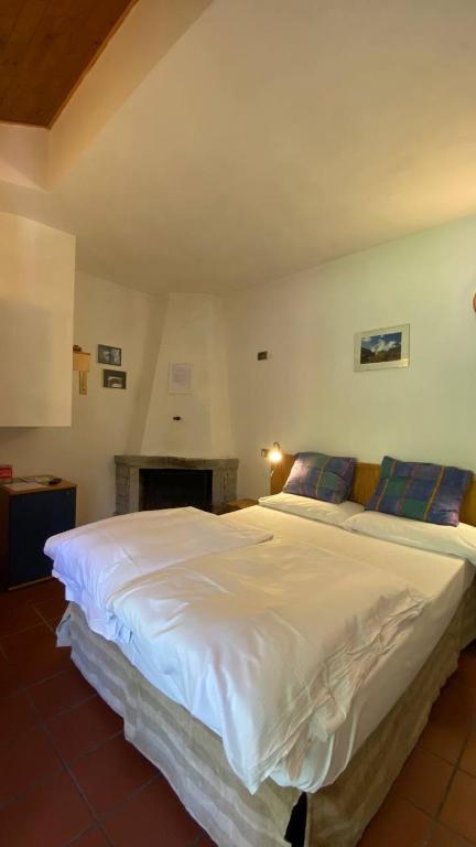 Postel nebo postele na pokoji v ubytování Residence Weissthor