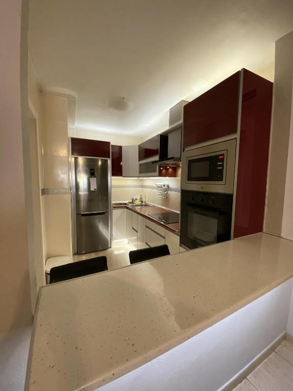 Kuchyň nebo kuchyňský kout v ubytování Apartamento Aguadulce Playa