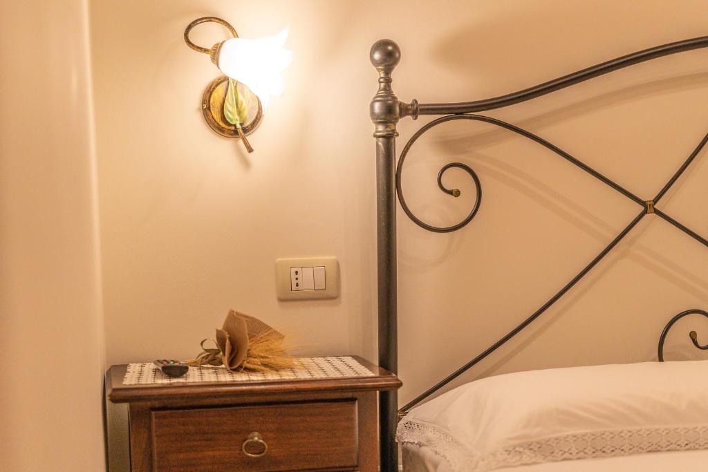 Łóżko lub łóżka w pokoju w obiekcie B&B Panaro