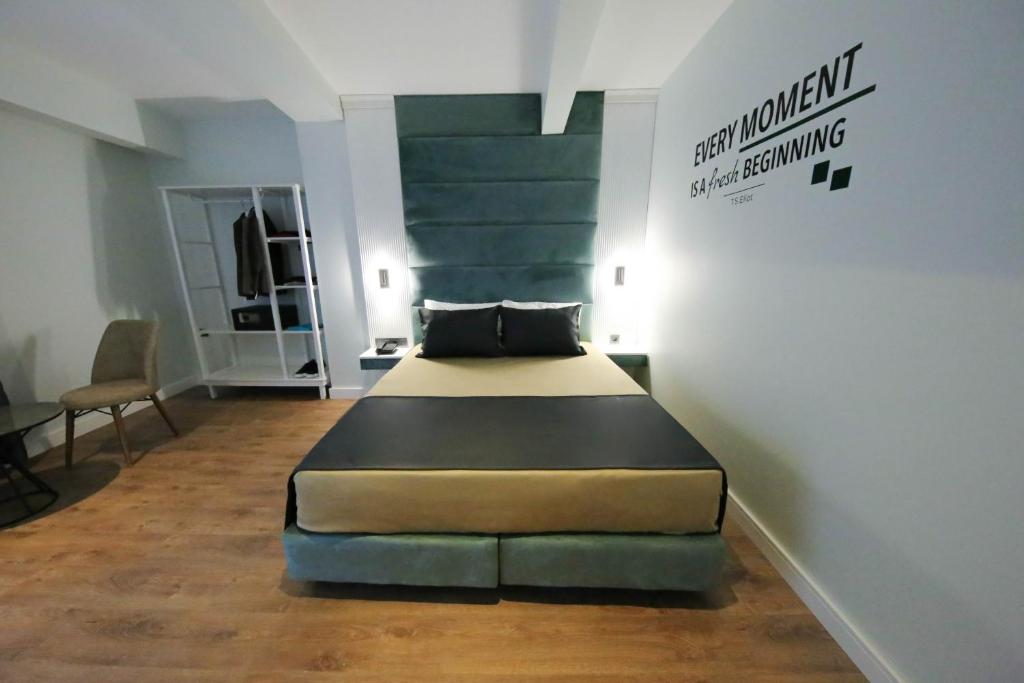 Postel nebo postele na pokoji v ubytování AXU AIRPORT HOTEL
