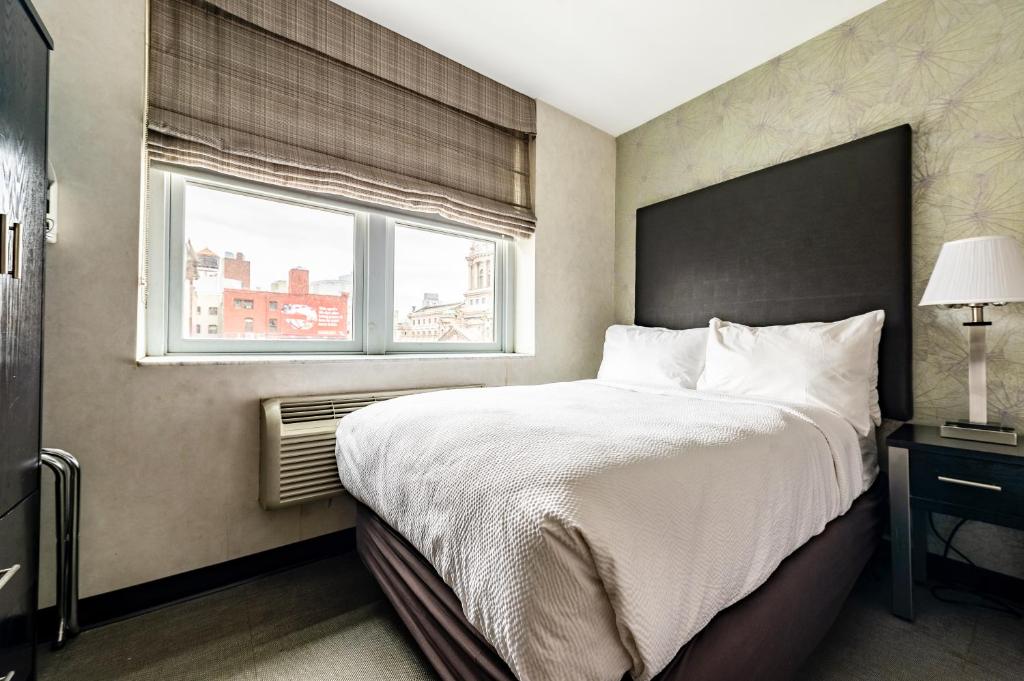 Cama ou camas em um quarto em Solita Soho Hotel