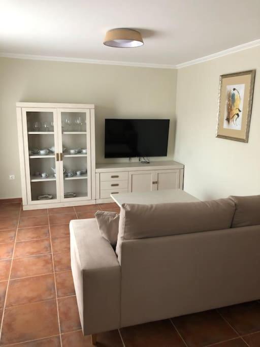 Televízia a/alebo spoločenská miestnosť v ubytovaní Casa Picual, Mancha Real, Jaén