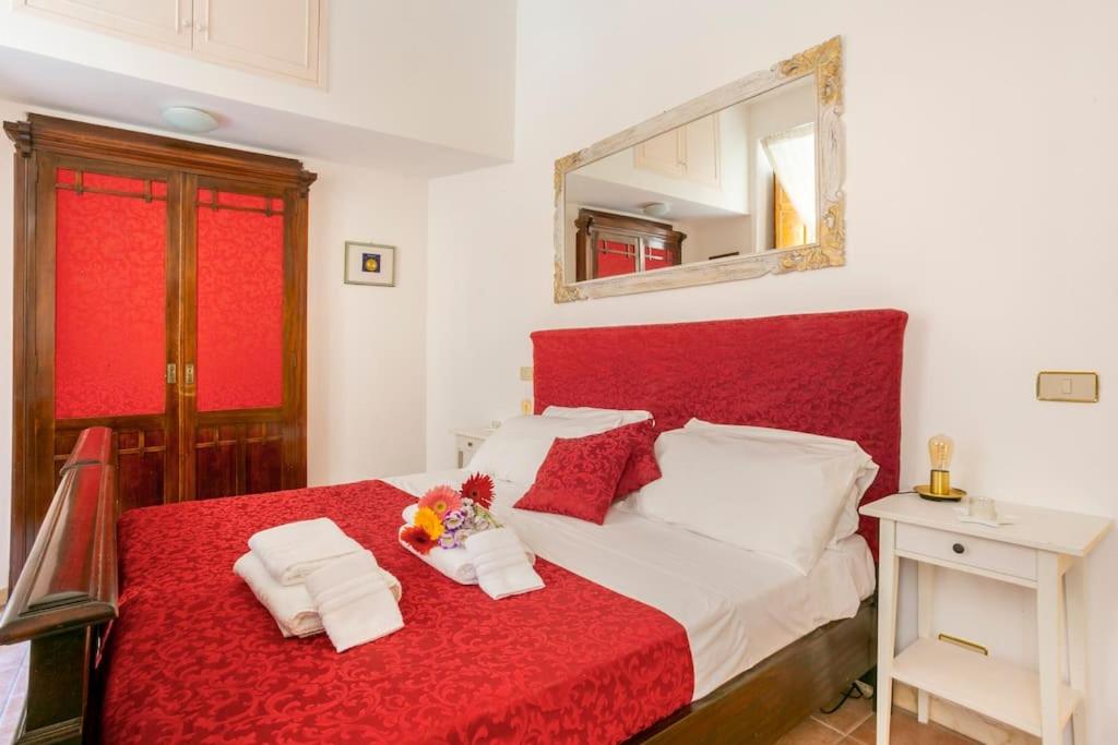 En eller flere senger på et rom på Cozy Apartment Spagna