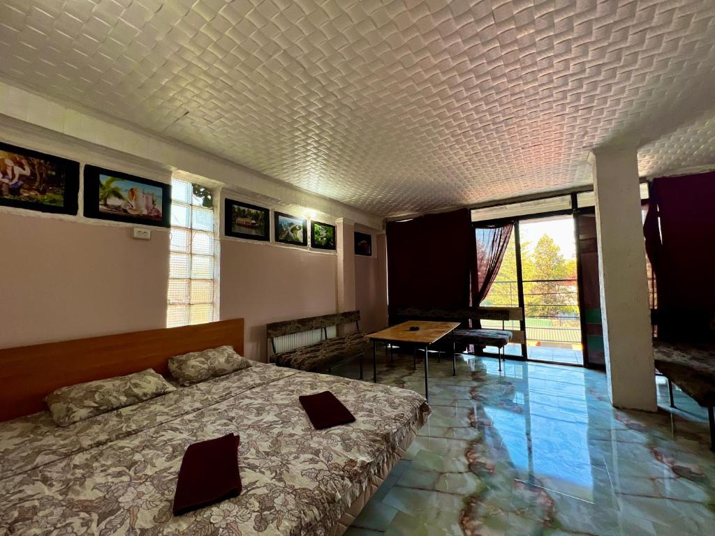 Llit o llits en una habitació de Smile Guesthouse