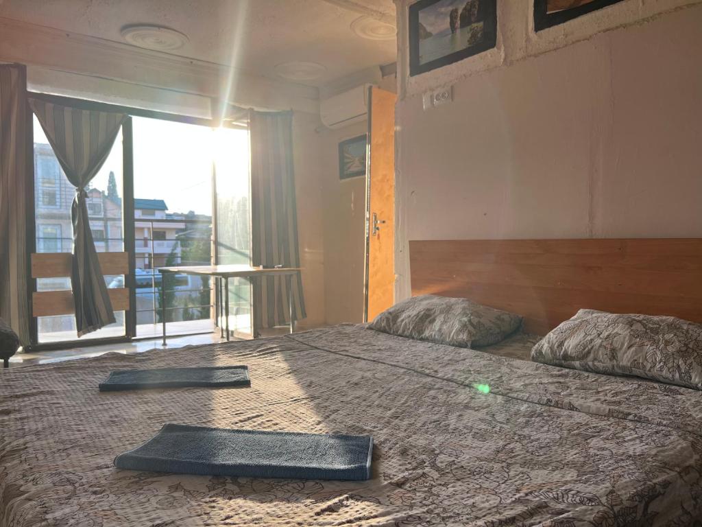 Llit o llits en una habitació de Smile Guesthouse