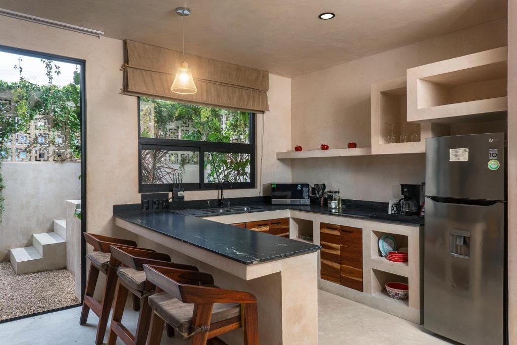 Kuchyň nebo kuchyňský kout v ubytování UJO Condo Boutique