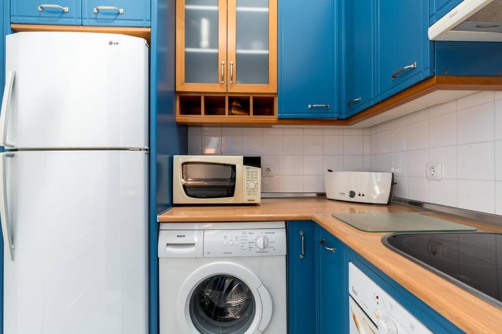 Kuchnia lub aneks kuchenny w obiekcie Apartamentos RG, San Vicente 22