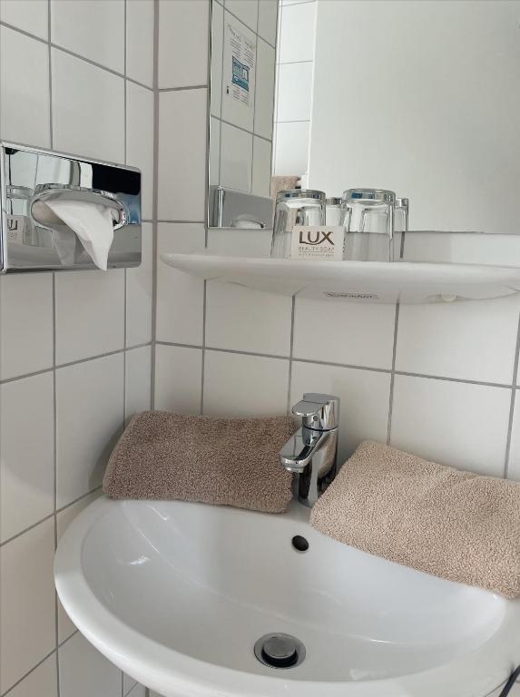 Koupelna v ubytování Hotel Berg