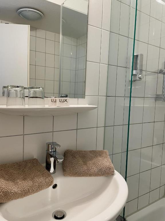 Koupelna v ubytování Hotel Berg
