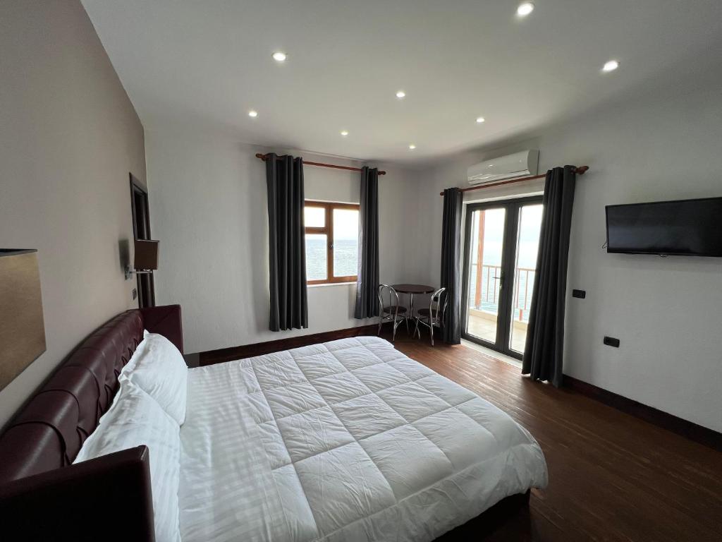 Voodi või voodid majutusasutuse Hotel Victoria toas