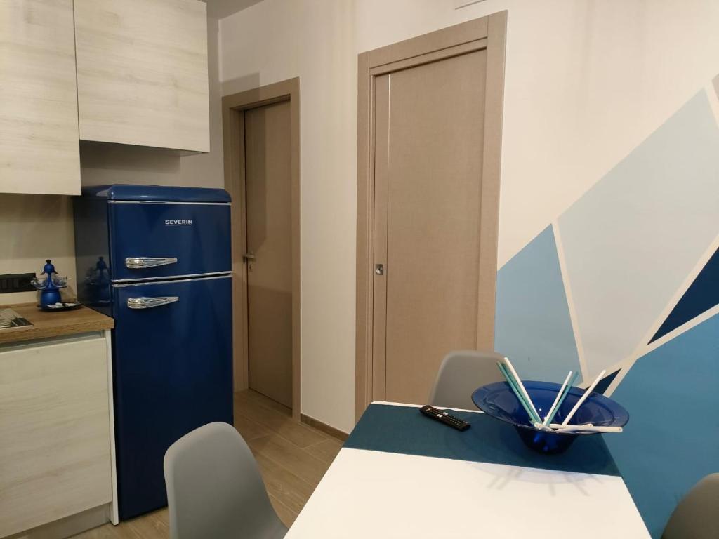 Kuchnia lub aneks kuchenny w obiekcie La Petite Maison