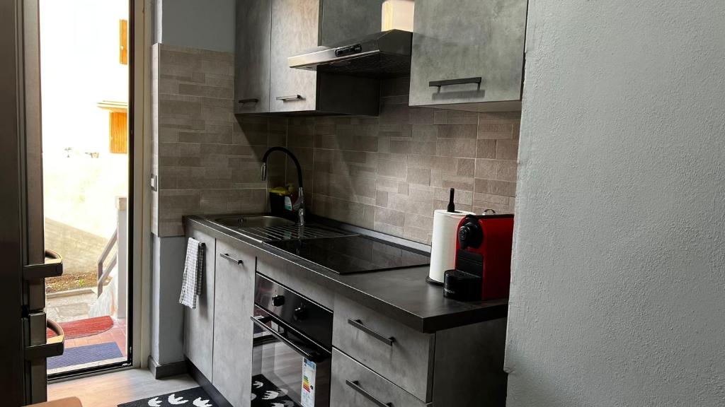 Kuchyň nebo kuchyňský kout v ubytování A.P. Appartamento o camera