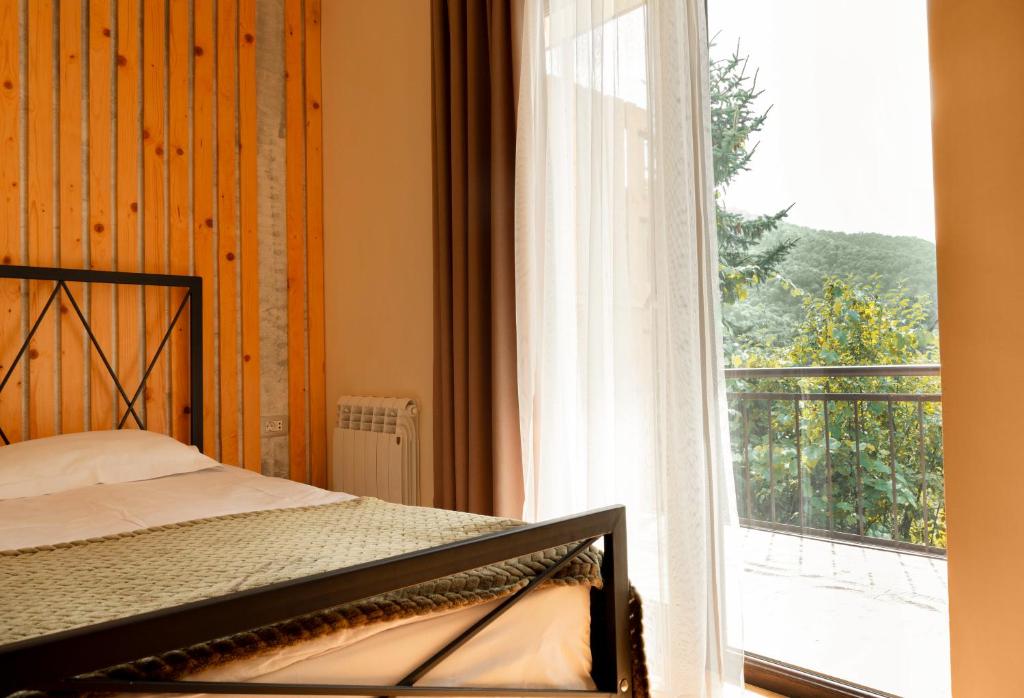 Postel nebo postele na pokoji v ubytování Arevatun Dilijan