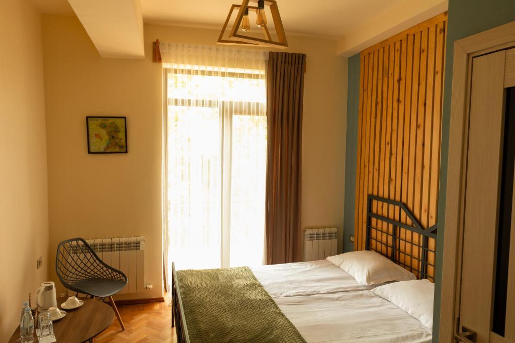 Postel nebo postele na pokoji v ubytování Arevatun Dilijan