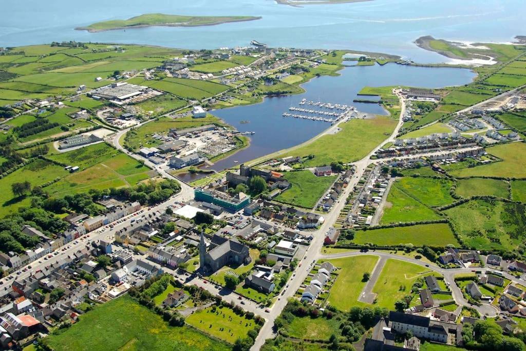 an aerial view of a town next to a body of water at Estuary View Apartment in Kilrush