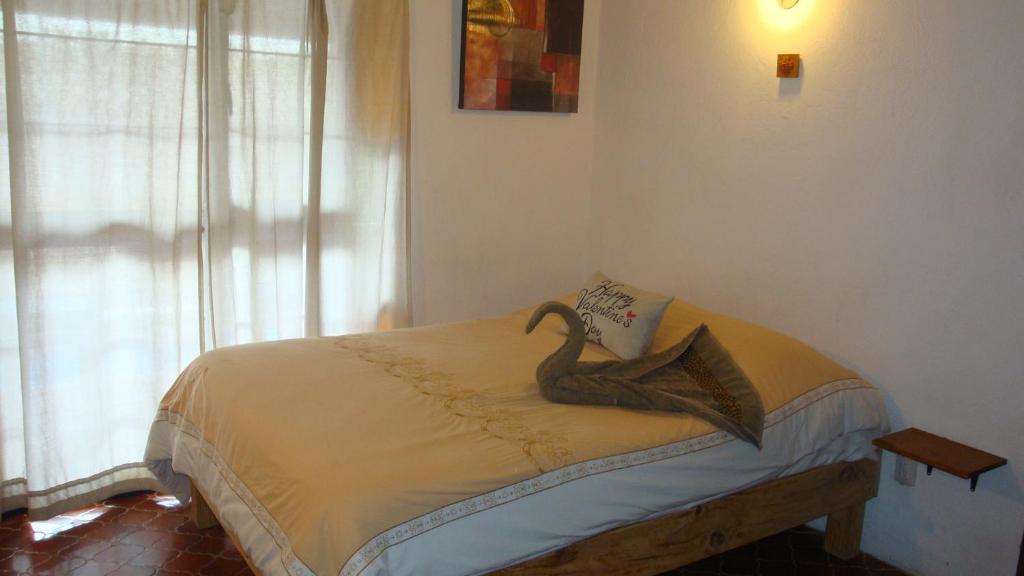 Ένα ή περισσότερα κρεβάτια σε δωμάτιο στο Manantial 41 tu Casa en Tequisquiapan