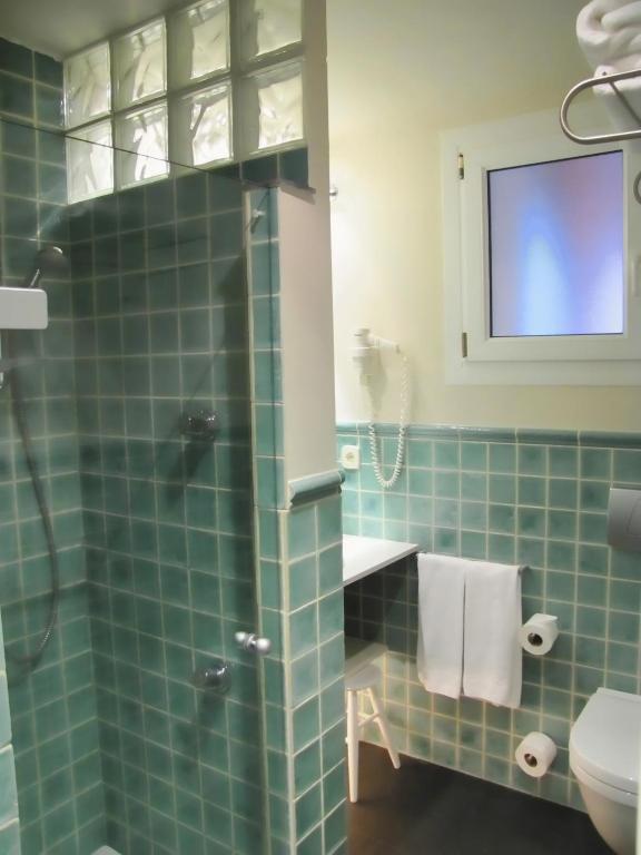 Koupelna v ubytování Hotel Sant Roc