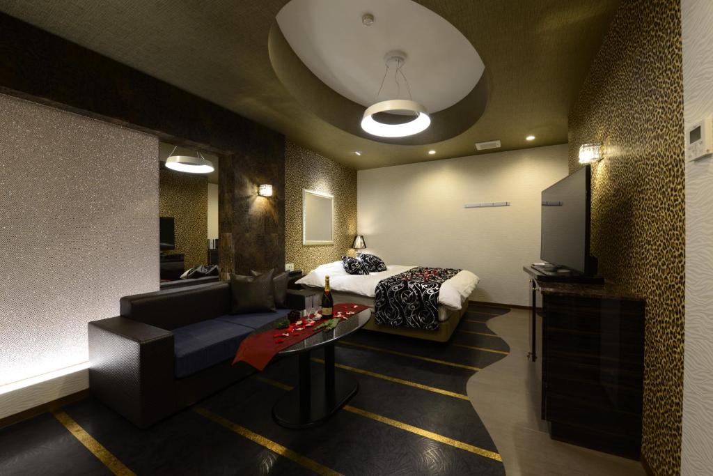TV a/nebo společenská místnost v ubytování Hotel S-CUBE (Adult Only)