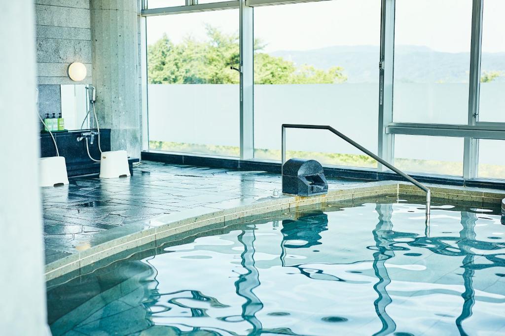 Bazén v ubytování KAMENOI HOTEL Fukui nebo v jeho okolí