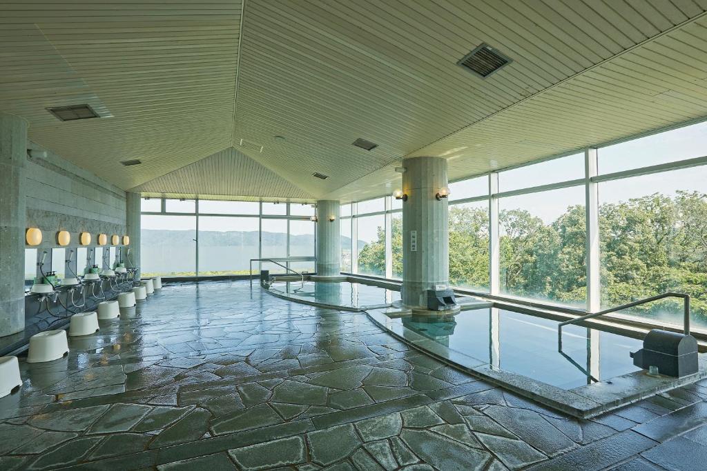 Bazén v ubytování KAMENOI HOTEL Fukui nebo v jeho okolí