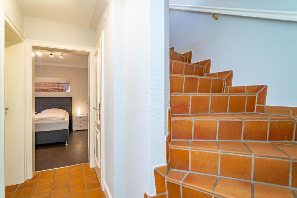 Postel nebo postele na pokoji v ubytování Haus Strandoase