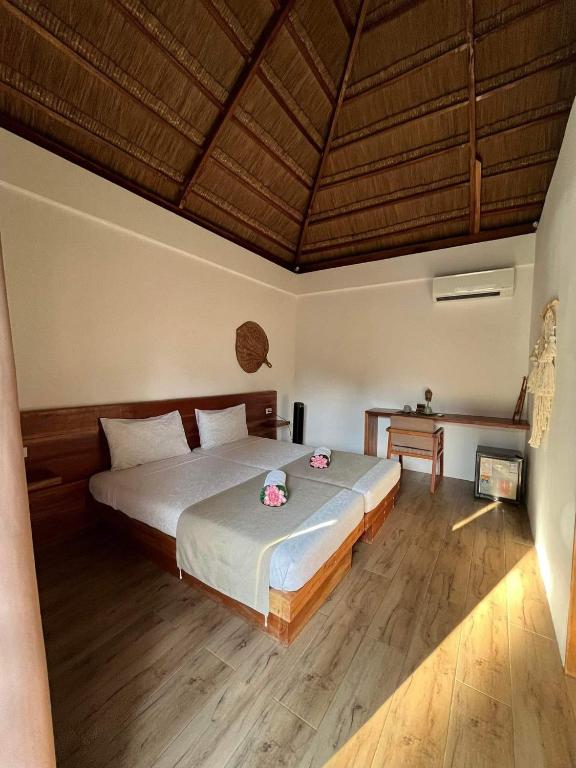 Postel nebo postele na pokoji v ubytování SAMADHI Resort & Hydrospa Panglao