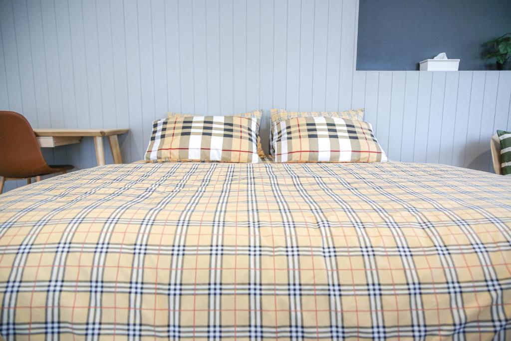 Postel nebo postele na pokoji v ubytování SLEEP SLEEP SUANPHAK Homestay