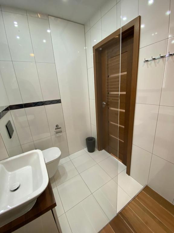 Kúpeľňa v ubytovaní OLIMPIC Apartament Klimatyzacja Garaż Winda Suwałki