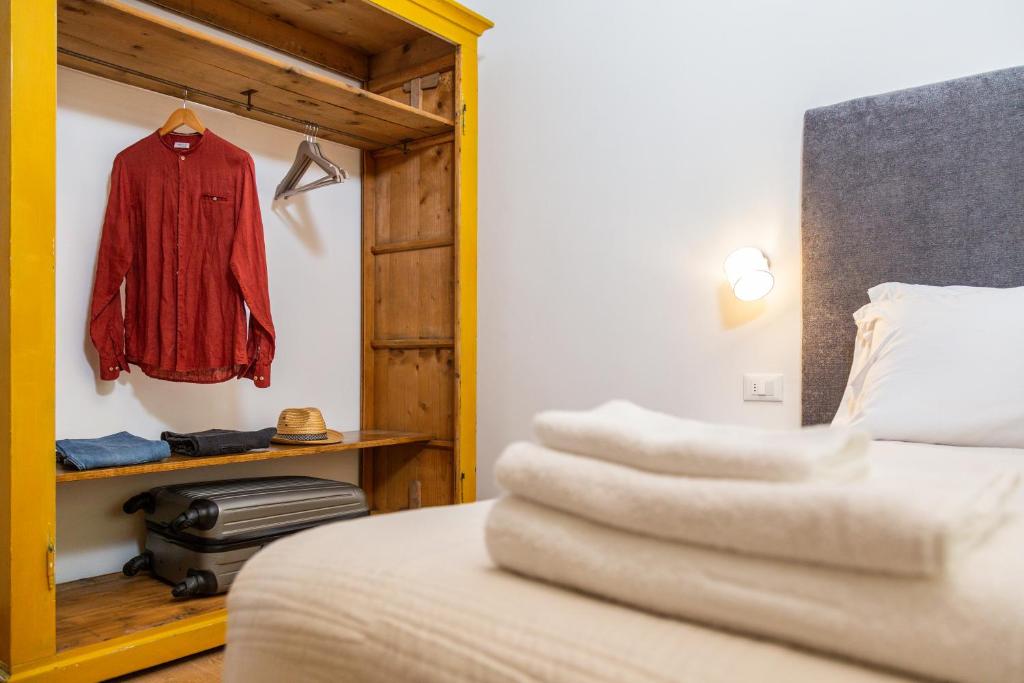 Postel nebo postele na pokoji v ubytování Monte Forru