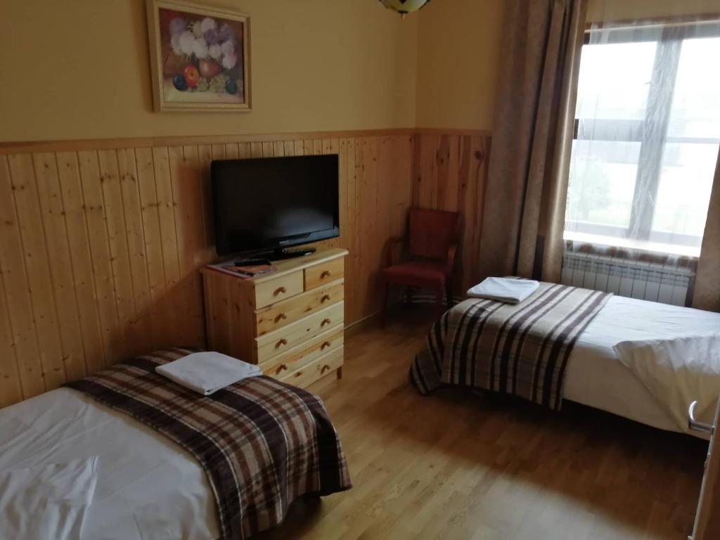 Postel nebo postele na pokoji v ubytování Paide B&B