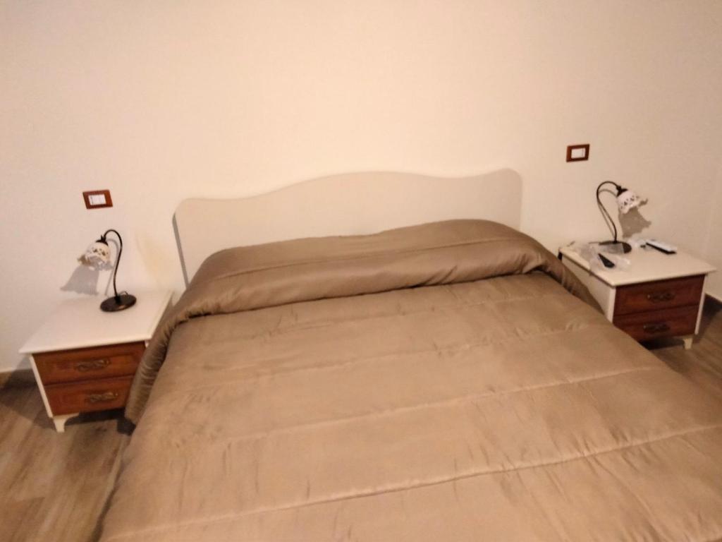 Posteľ alebo postele v izbe v ubytovaní Ai doganieri