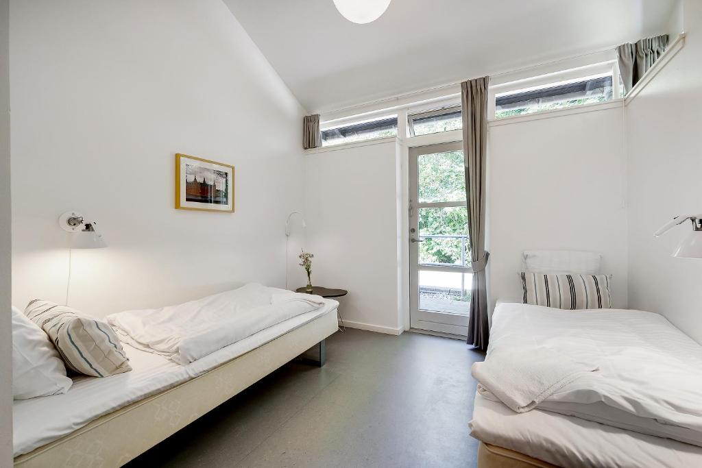 Postel nebo postele na pokoji v ubytování Danhostel Hillerød