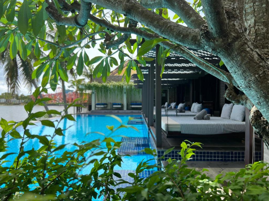 Bazén v ubytování THE BLOSSOM RESORT ISLAND DA NANG - Onsen Included nebo v jeho okolí
