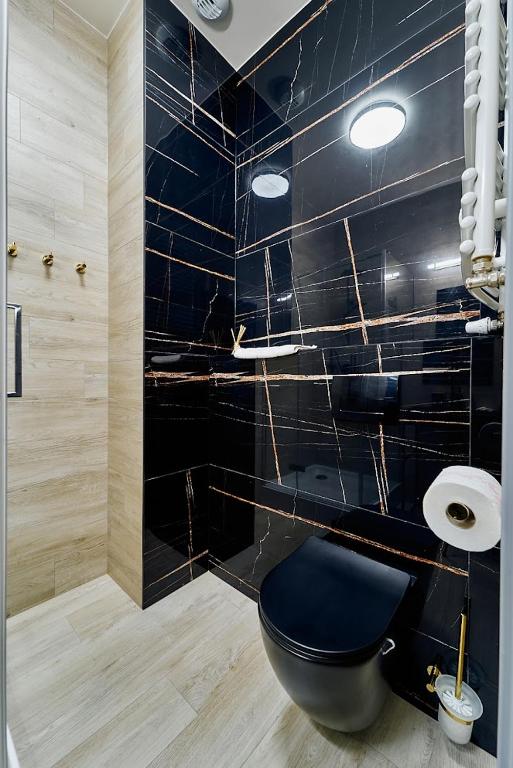 Kúpeľňa v ubytovaní LAGUNA Apartament Polanica Residence 57
