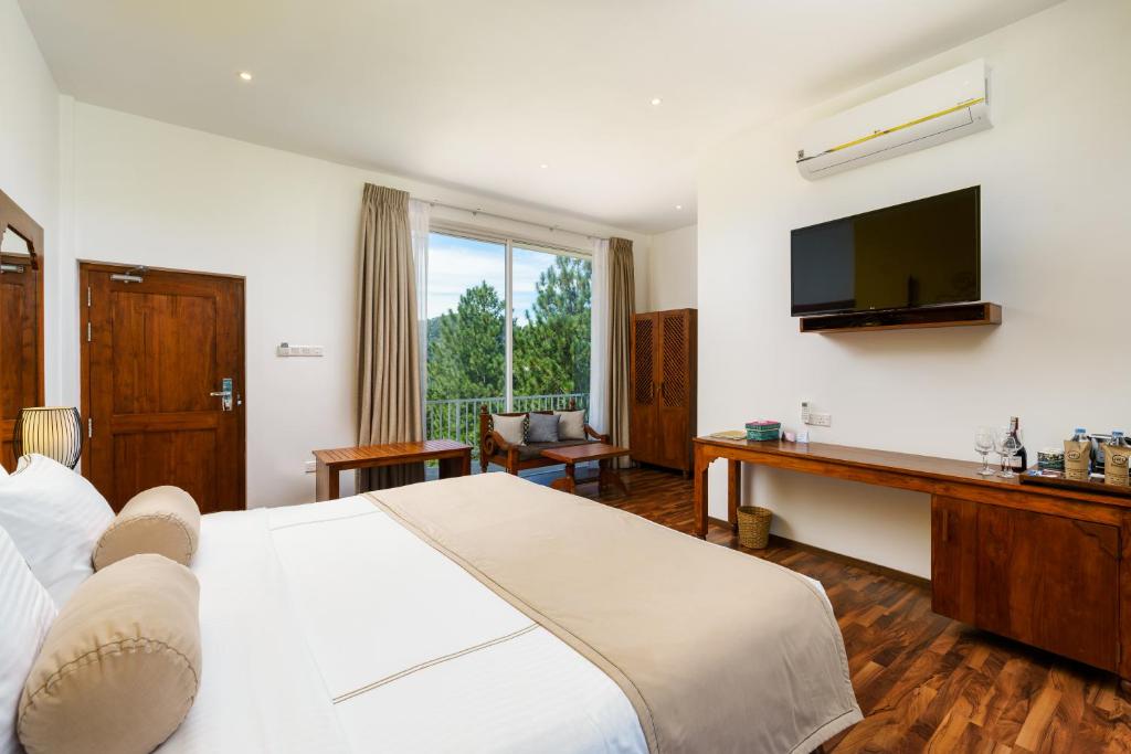 TV a/nebo společenská místnost v ubytování Morning Dew Boutique Hotel Ella