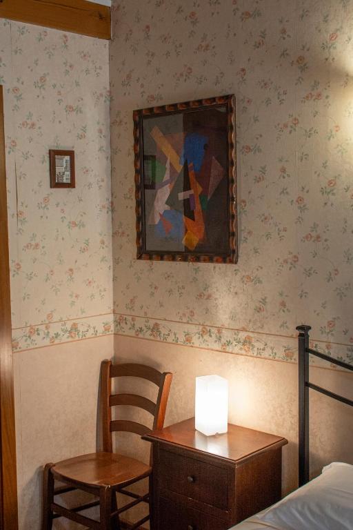 Postel nebo postele na pokoji v ubytování Hotel Capitelli
