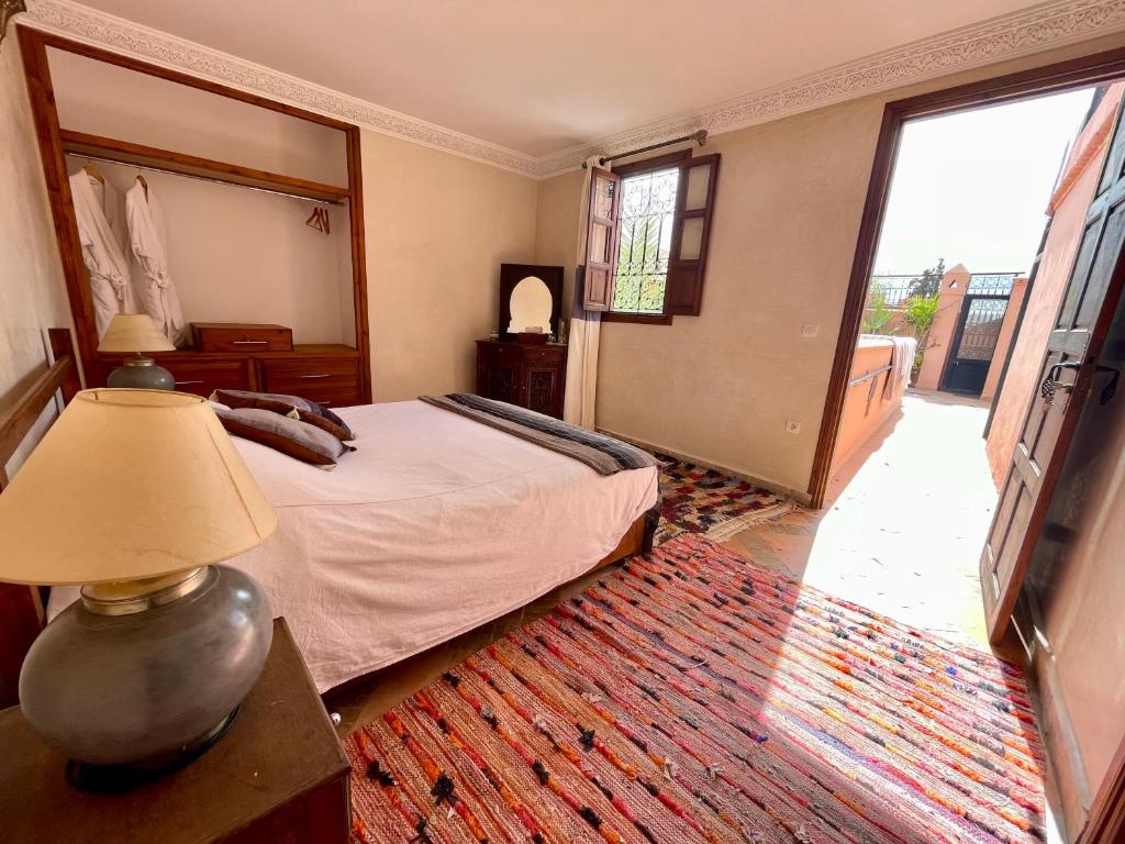 Postel nebo postele na pokoji v ubytování Riad Elias & Spa
