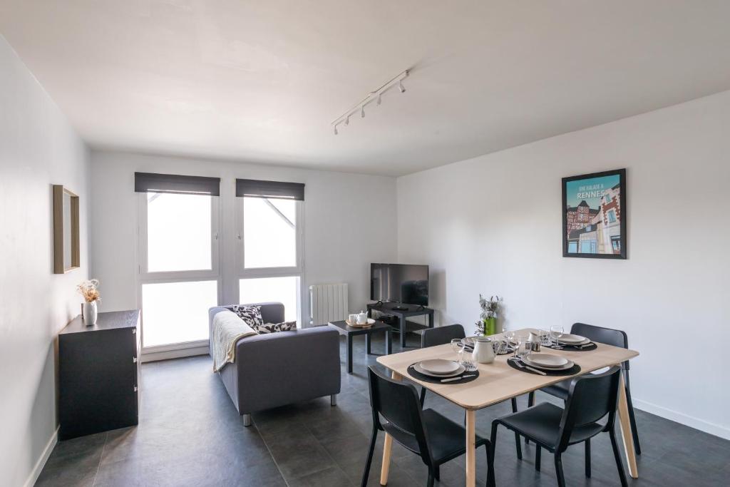 Televízia a/alebo spoločenská miestnosť v ubytovaní Coeur Courrouze - Appartement 2 chambres avec parking