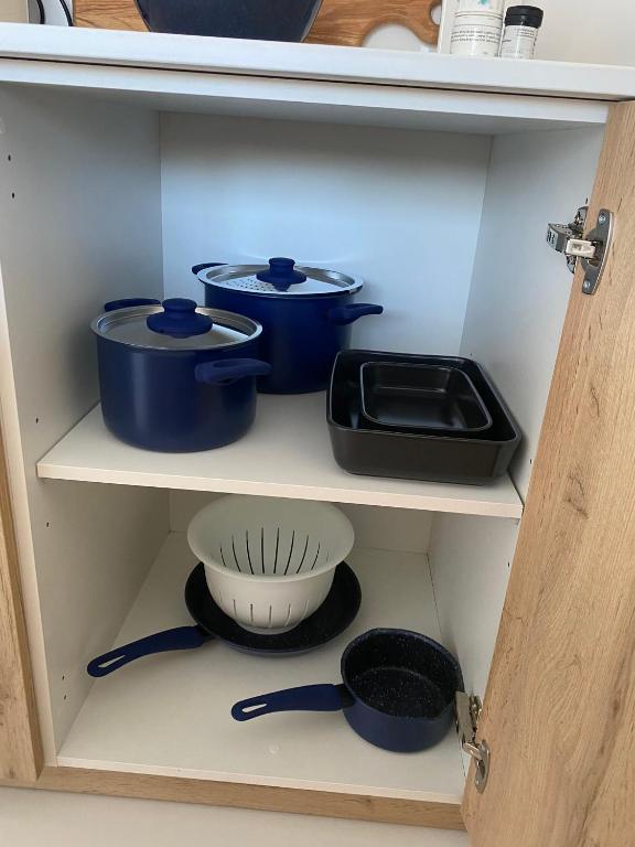 A kitchen or kitchenette at HORIZON VACATION HOME - Aloe 112