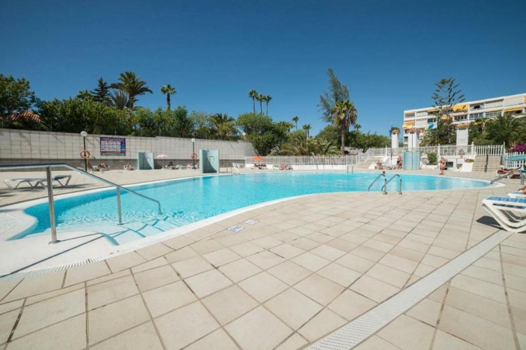 The swimming pool at or close to HORIZON VACATION HOME - Aloe 112