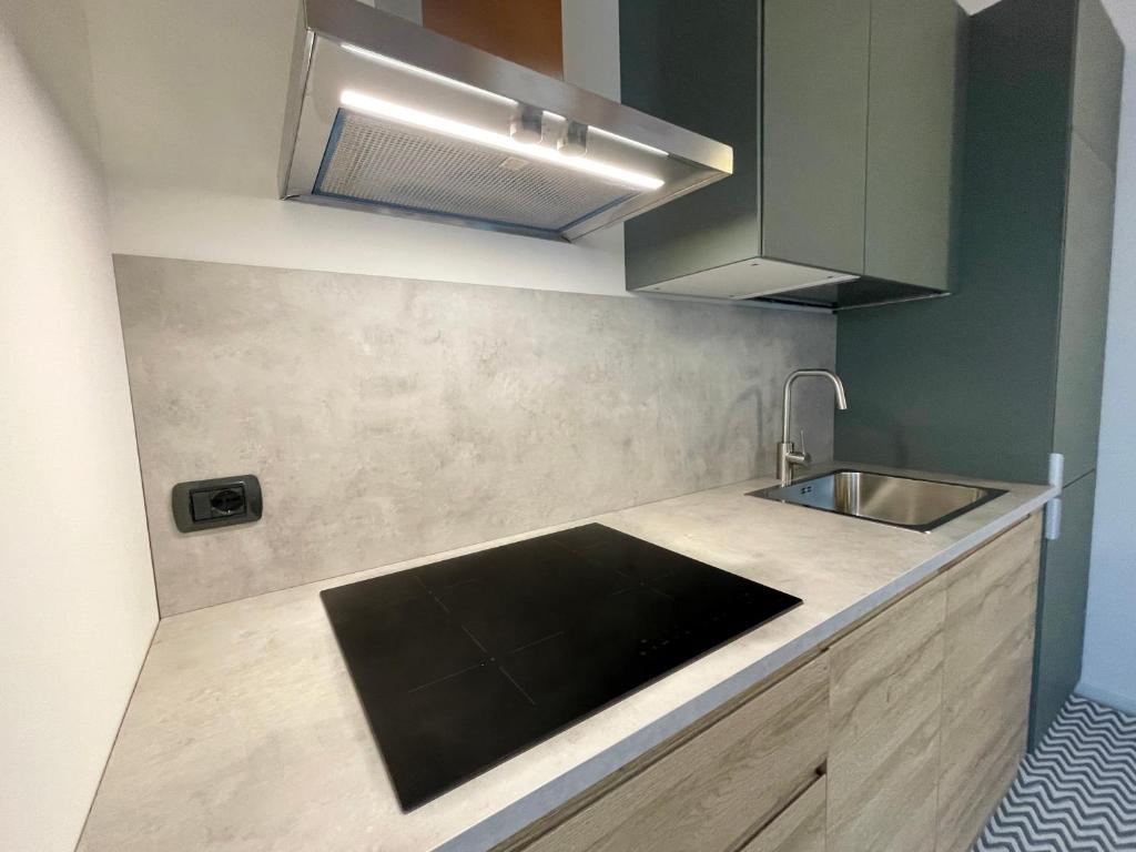 Kuchyň nebo kuchyňský kout v ubytování La corte in Franciacorta