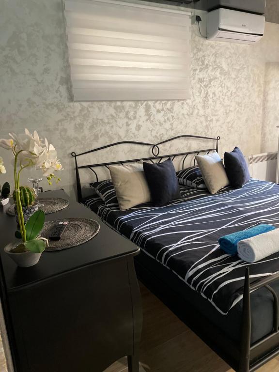 Postel nebo postele na pokoji v ubytování Apartman Stefan Lux